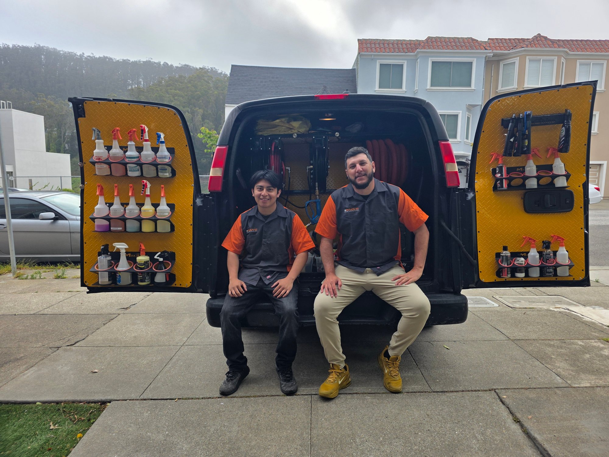 Innovo team with a fully equipped mobile detailing van.